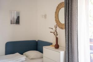 Postel nebo postele na pokoji v ubytování Nada Apartman