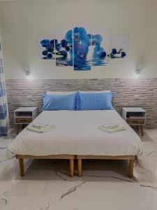 Ένα ή περισσότερα κρεβάτια σε δωμάτιο στο Little Gardens Guest House