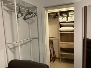 a room with a closet with some towels at Aura Diest in Diest