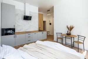 Romari Туган Барановського 30にあるキッチンまたは簡易キッチン