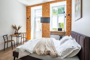 Romari Туган Барановського 30にあるテレビまたはエンターテインメントセンター