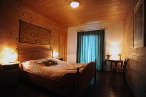 Cama ou camas em um quarto em Eco Hotel Locanda del Giglio