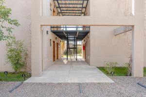 an empty hallway of a building at The Lodge Chacras in Ciudad Lujan de Cuyo