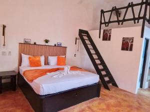 Postel nebo postele na pokoji v ubytování Hotel Rincon Rubi