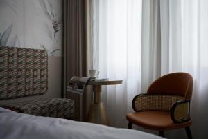 Ένα ή περισσότερα κρεβάτια σε δωμάτιο στο Renjoy Hotel -Xiamen Zhongshan Road Pedestrian Street