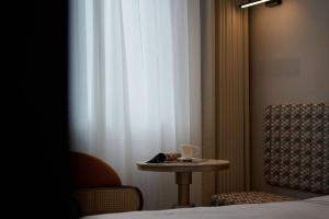 Ένα ή περισσότερα κρεβάτια σε δωμάτιο στο Renjoy Hotel -Xiamen Zhongshan Road Pedestrian Street