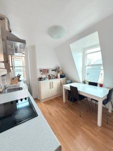 Η κουζίνα ή μικρή κουζίνα στο Liberty Stockwell Rooms