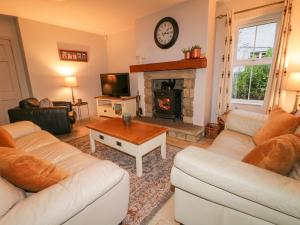 Posezení v ubytování Gooseberry Cottage