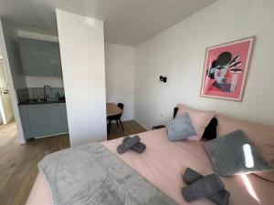Ένα ή περισσότερα κρεβάτια σε δωμάτιο στο GuestReady - Charming Stay near Paris +52 φωτογραφίες