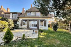 Κήπος έξω από το Villa sur la plage Deauville