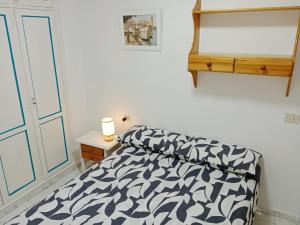 Postel nebo postele na pokoji v ubytování casitaRino