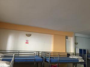 Postel nebo postele na pokoji v ubytování Tenerife Hostel
