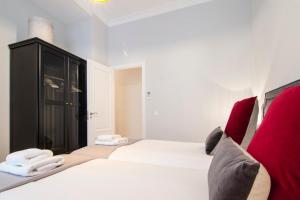 A bed or beds in a room at Minty Stay - Atocha 4 BD