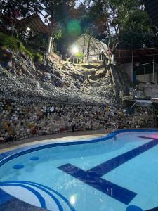 Bazén v ubytování Cabaña paraiso nebo v jeho okolí