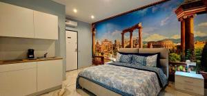 a bedroom with a large painting on the wall at Il Magnifico Superior Rooms 400m from Tiburtina Railway Station and 290m from Metro in Rome