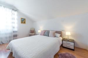 Ein Bett oder Betten in einem Zimmer der Unterkunft Villa Nick