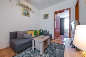 Ein Sitzbereich in der Unterkunft Villa Nick