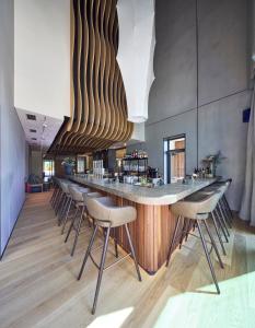 Reštaurácia alebo iné gastronomické zariadenie v ubytovaní Das Walchsee Resort