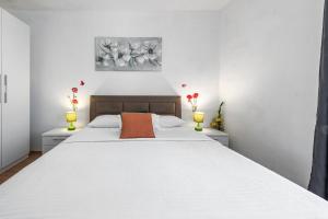 Ein Bett oder Betten in einem Zimmer der Unterkunft Villa Nick