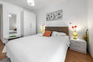 Ein Bett oder Betten in einem Zimmer der Unterkunft Villa Nick