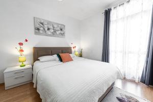 Ein Bett oder Betten in einem Zimmer der Unterkunft Villa Nick