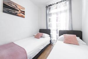 Ein Bett oder Betten in einem Zimmer der Unterkunft Villa Nick