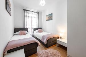 Ein Bett oder Betten in einem Zimmer der Unterkunft Villa Nick