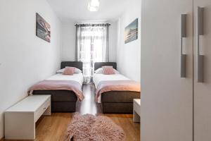 Ein Bett oder Betten in einem Zimmer der Unterkunft Villa Nick