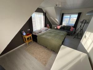 Postel nebo postele na pokoji v ubytování Luk House