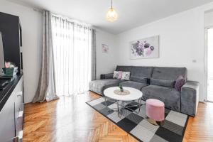 Ein Sitzbereich in der Unterkunft Villa Nick