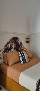 Кровать или кровати в номере Dimora Cocchi in Corte