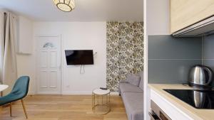 Η κουζίνα ή μικρή κουζίνα στο 861 Suite Marguerite - Superbe Appartement