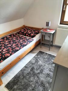 Postel nebo postele na pokoji v ubytování Ferienwohnung Schmidt, 95131