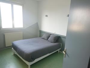 Postel nebo postele na pokoji v ubytování LE NEW FLORIMONT
