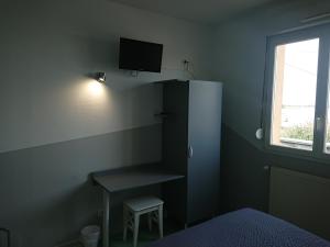 TV a/nebo společenská místnost v ubytování LE NEW FLORIMONT