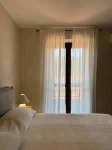 Ένα ή περισσότερα κρεβάτια σε δωμάτιο στο Casa Magenta Holiday +8 φωτογραφίες