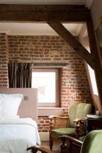 Postel nebo postele na pokoji v ubytování Guesthouse Recour