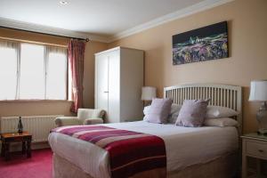 Katil atau katil-katil dalam bilik di The Moorings Hotel & Seafood Restaurant