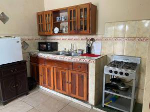 Kuchyň nebo kuchyňský kout v ubytování Apartamento Altos Dos Pinos