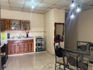 Kuchyň nebo kuchyňský kout v ubytování Apartamento Altos Dos Pinos