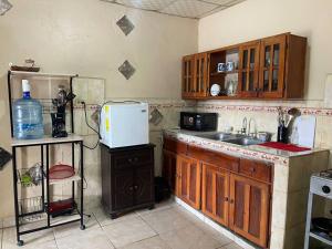Kuchyň nebo kuchyňský kout v ubytování Apartamento Altos Dos Pinos