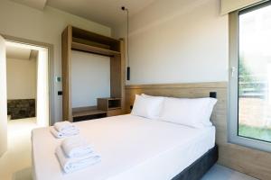 Ένα ή περισσότερα κρεβάτια σε δωμάτιο στο Luxury Villa U with private swimming pool