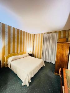 Posteľ alebo postele v izbe v ubytovaní Orange Garden Guest House