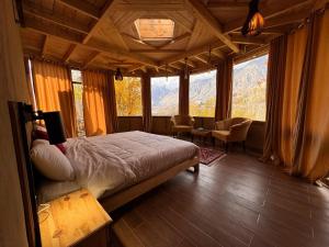 Postel nebo postele na pokoji v ubytování Manasau Resort