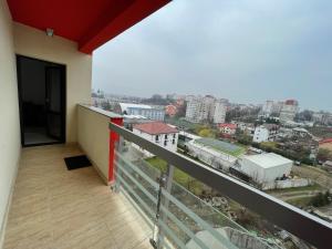 a balcony with a view of a city at Renting Solutions Deluxe in Iaşi