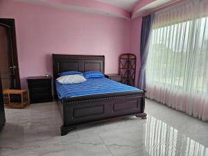 Фотография из галереи Casa Mooreski NaranjitoLuxury Home sleeps 8 в городе Naranjito