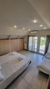 Postel nebo postele na pokoji v ubytování Eva’s Corner House