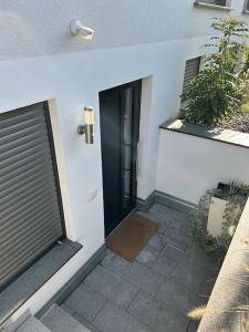 Balkón nebo terasa v ubytování Charmante Einliegerwohnung im grünen Katzwang