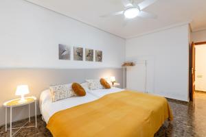 A bed or beds in a room at Fidalsa Paradise Pines