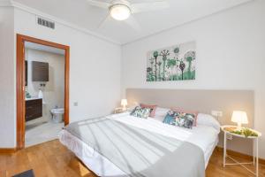 A bed or beds in a room at Fidalsa Paradise Pines